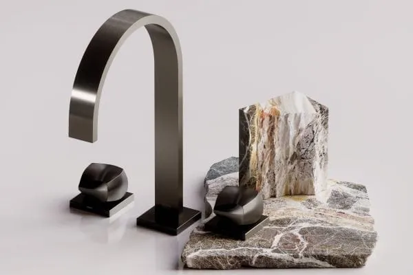 Mit &bdquo;The Rock&ldquo; stellt der Armaturenhersteller Dornbracht seine erste Atelier Edition vor. Die klaren Linien des Klassikers MEM treffen hier auf expressive Griffe in Felsform, die aus massivem Metall gefertigt und in Dark Platinum geb&uuml;rstet veredelt sind.